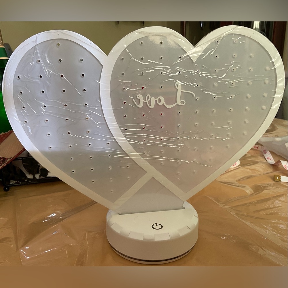 Hutuzldz: Double heart shaped design white acrylic earrings holder/organizer.